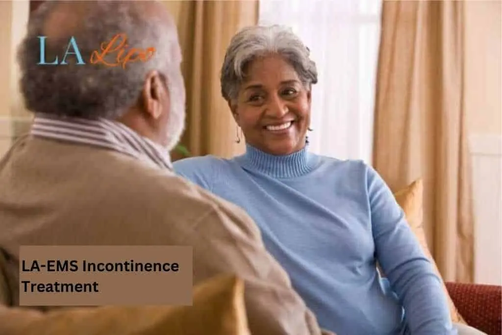 Couple sat smiling at each other - LA-EMS treatment Borehamwood